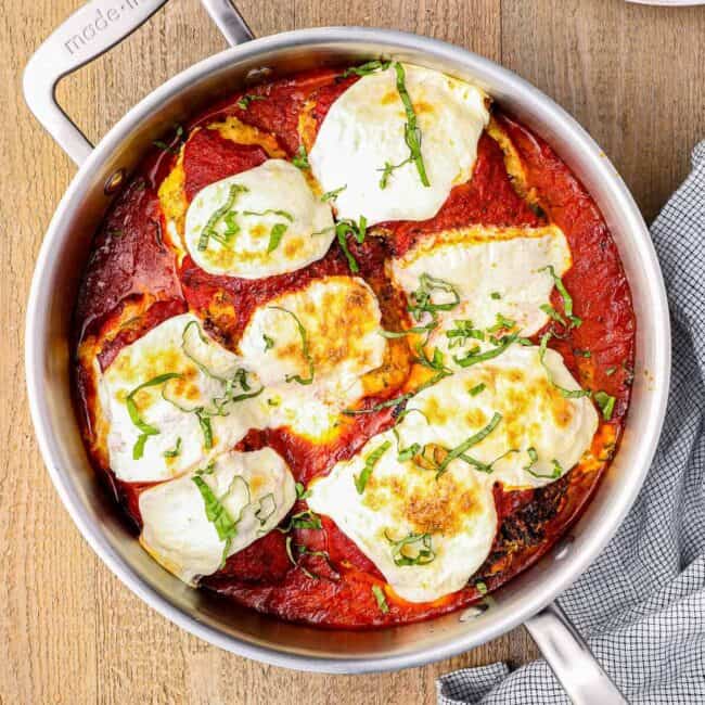 stuffed chicken parmesan in a skillet.