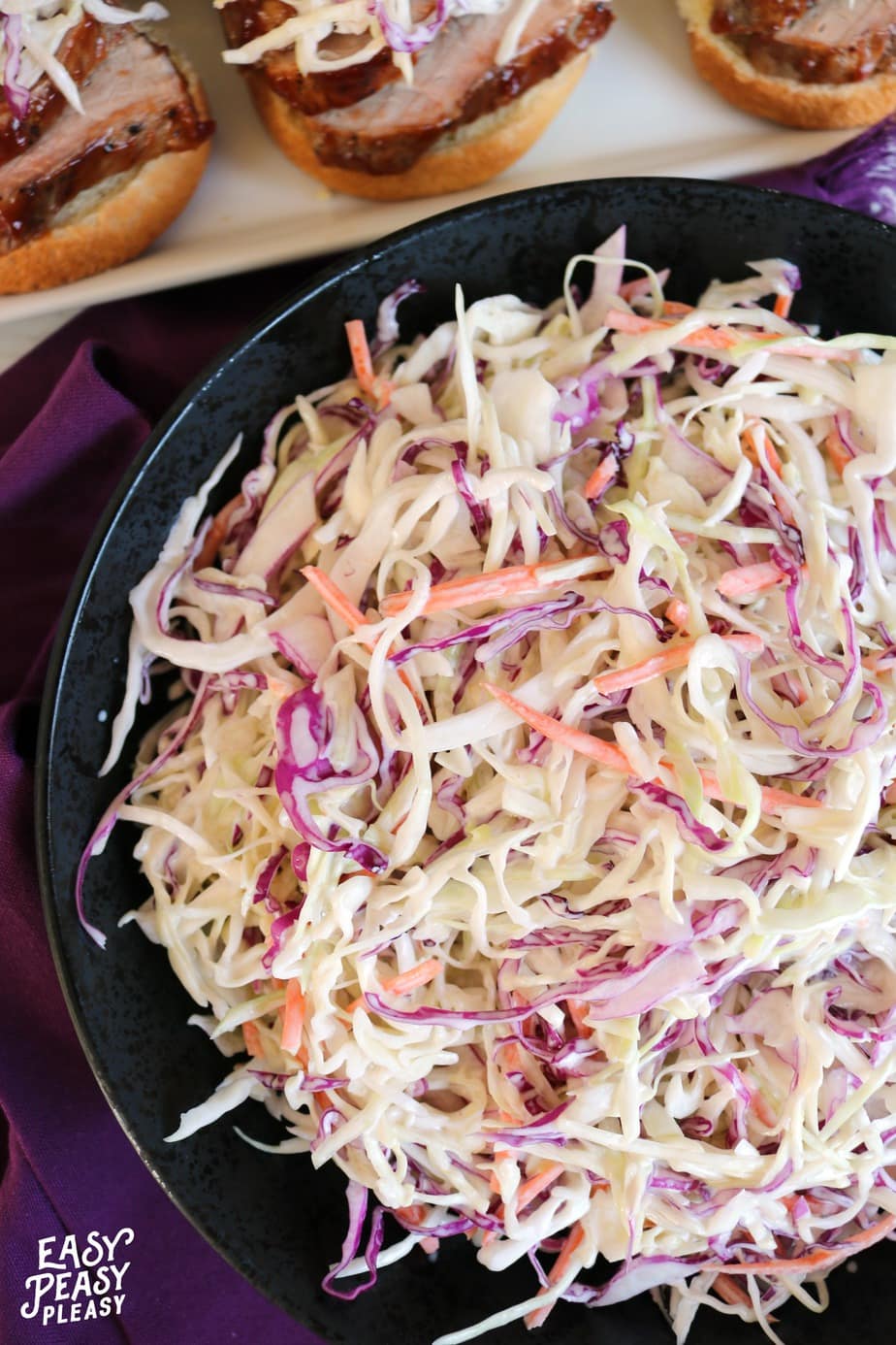 The perfect Coleslaw recipe for your next BBQ or cookout. It's a quick and easy recipe perfect on top of a pork sandwich.