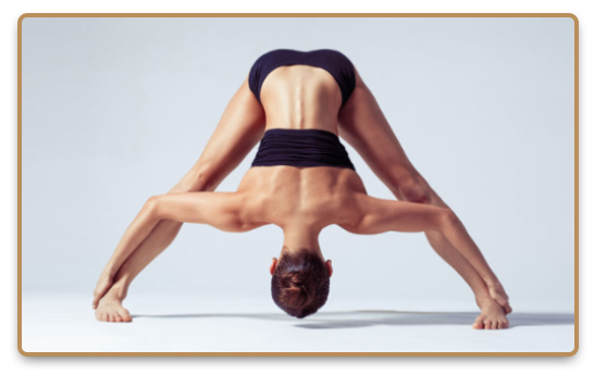 Woman during Bikram yoga or hot yoga practice