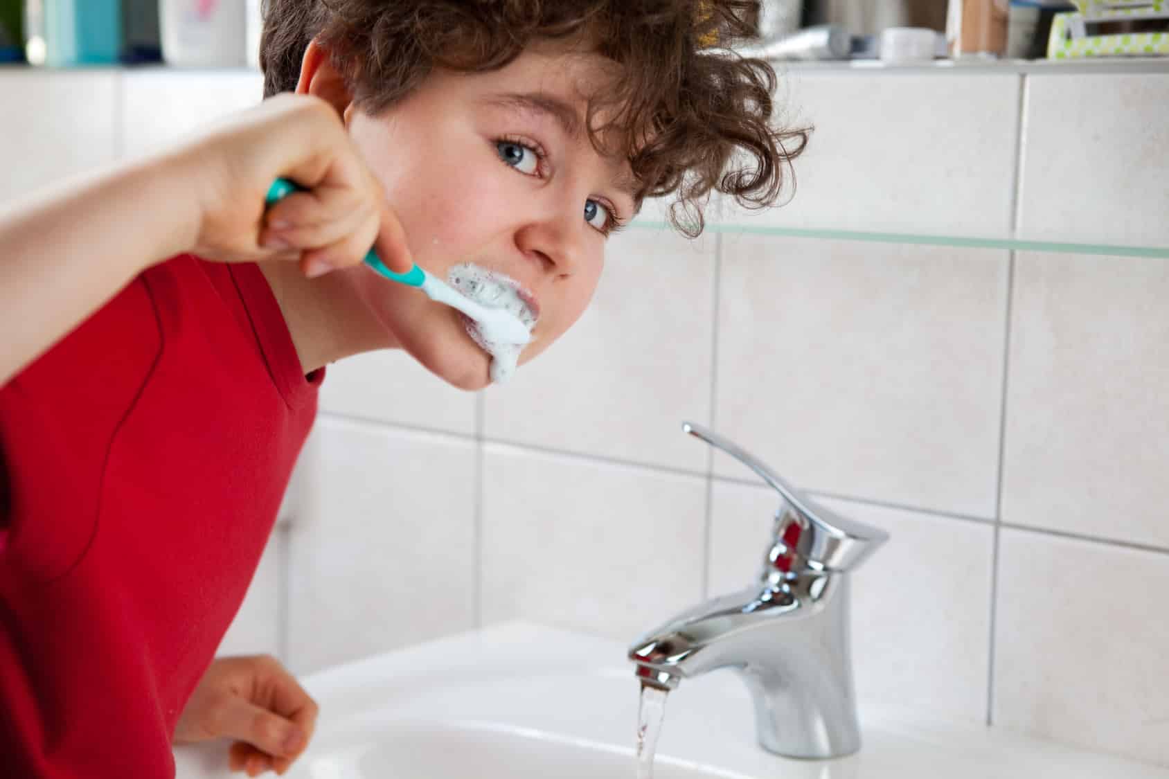 Conserve Water Brushing Teeth image.