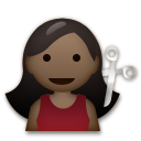 Cómo se ve el emoji Persona cortándose el pelo: tono de piel oscuro en Lg.