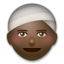 Cómo se ve el emoji Persona con turbante: tono de piel oscuro en Lg.