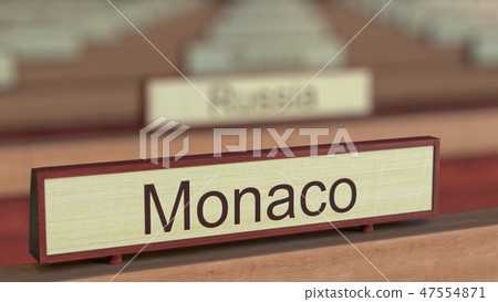 Monaco name sign among different countries plaques at international organization. 3D rendering 47554871