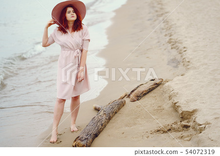 pretty girl in a beach 54072319