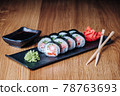 Sushi on a Wooden Table in Restaurant, Delicious Japanese Food, Sushi Rolls 78763693