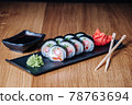 Sushi on a Wooden Table in Restaurant, Delicious Japanese Food, Sushi Rolls 78763694