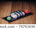 Sushi on a Wooden Table in Restaurant, Delicious Japanese Food, Sushi Rolls 78763696