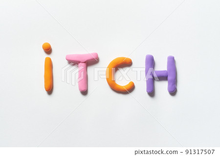 Itch formed of colorful plasticine. 91317507