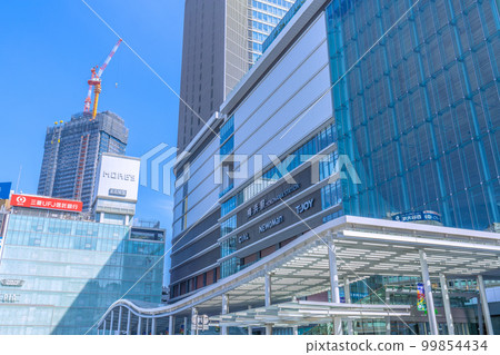 Yokohama Cityscape, Japan Yokohama Station West Exit. View of JR Yokohama Tower and Yokohama Station against the blue sky 99854434