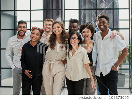 Team at work. Group of young business people in smart casual wear working together in creative office 103873095