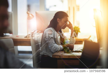 Depression, burnout or business woman with headache in office with fatigue, anxiety or stress. Depressed employee, sad female consultant or tired person frustrated with migraine pain in workplace 107568596