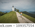 Jamnik, Slovenia. The Jamnik Church is a charming 15th-century chapel in the Kamnik-Savinja Alps near Kranj, breathtaking views of the surrounding mountainous landscape. The Church of St. Primoz 109357554