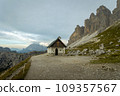 One of the most famous and spectacular views of all the Alps: the locatelli refuge, its church and the three peaks of Lavaredo, inside the Three Peaks-Sesto Dolomites Natural Park 109357567