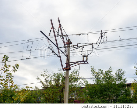 The atmosphere of the railway in cloudy weather. Train electricity lines.  Transport system. 111115253