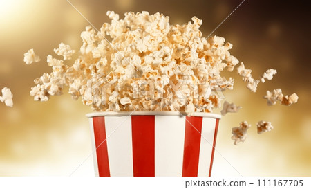 Popcorn Flying up in the Air from Paper Bucket. 111167705