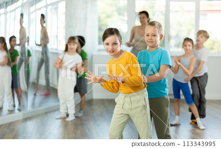 Group of children dancing couple twist dance 113343995