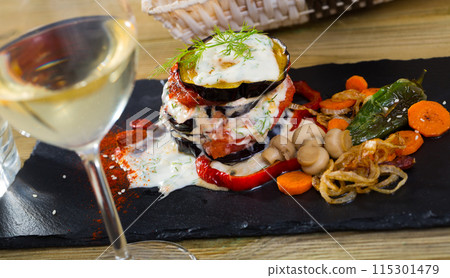 Fried eggplant and tomato pyramid 115301479