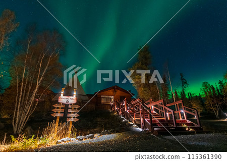 Yellowknife, Northwest Territories, Canada - September 24 2022 : Northern lights at Aurora Village in Yellowknife night. 115361390