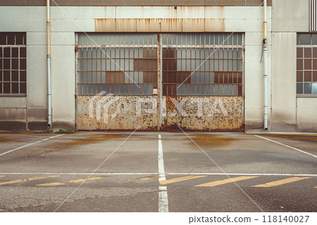 Vintage Industrial Garage with Rusted Doors and Weathered Warehouse Exterior, AI-generated item 118140027