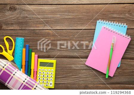 School supplies with notebook on grey background. Back to school. Flat lay. 119294368