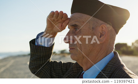 United States Veteran Greets The Arrival Of Marines On The Beach Near The Ocean 119397421