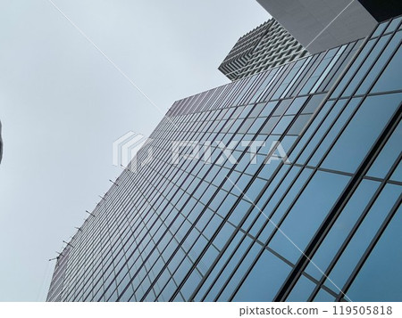 View from underneath a skyscraper 119505818