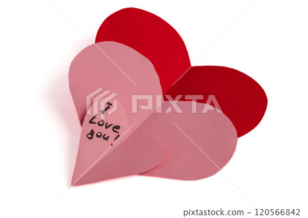 Red and pink paper hearts with the inscription I love you on a white background 120566842