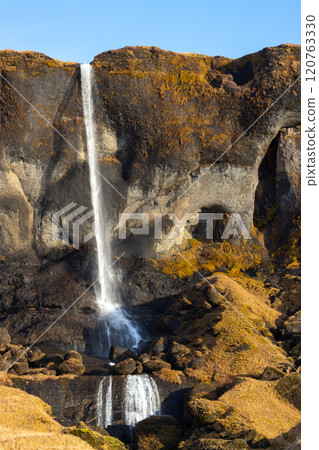 Mountain and waterfall Foss a Sidu, south Iceland 120763330