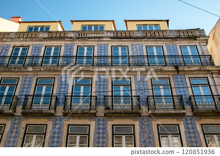 Lisbon, Portugal, facade of colorful old houses with windows, European historical buildings, cozy cityscape, Portuguese streets landscape 120851936