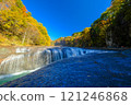 Waterfall falling into a crevice in the rocks 121246868