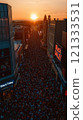 Aerial view of Black Friday crowds at sunset in urban setting 121333531