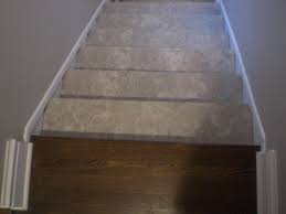 Install the center carpet tiles . Stairs