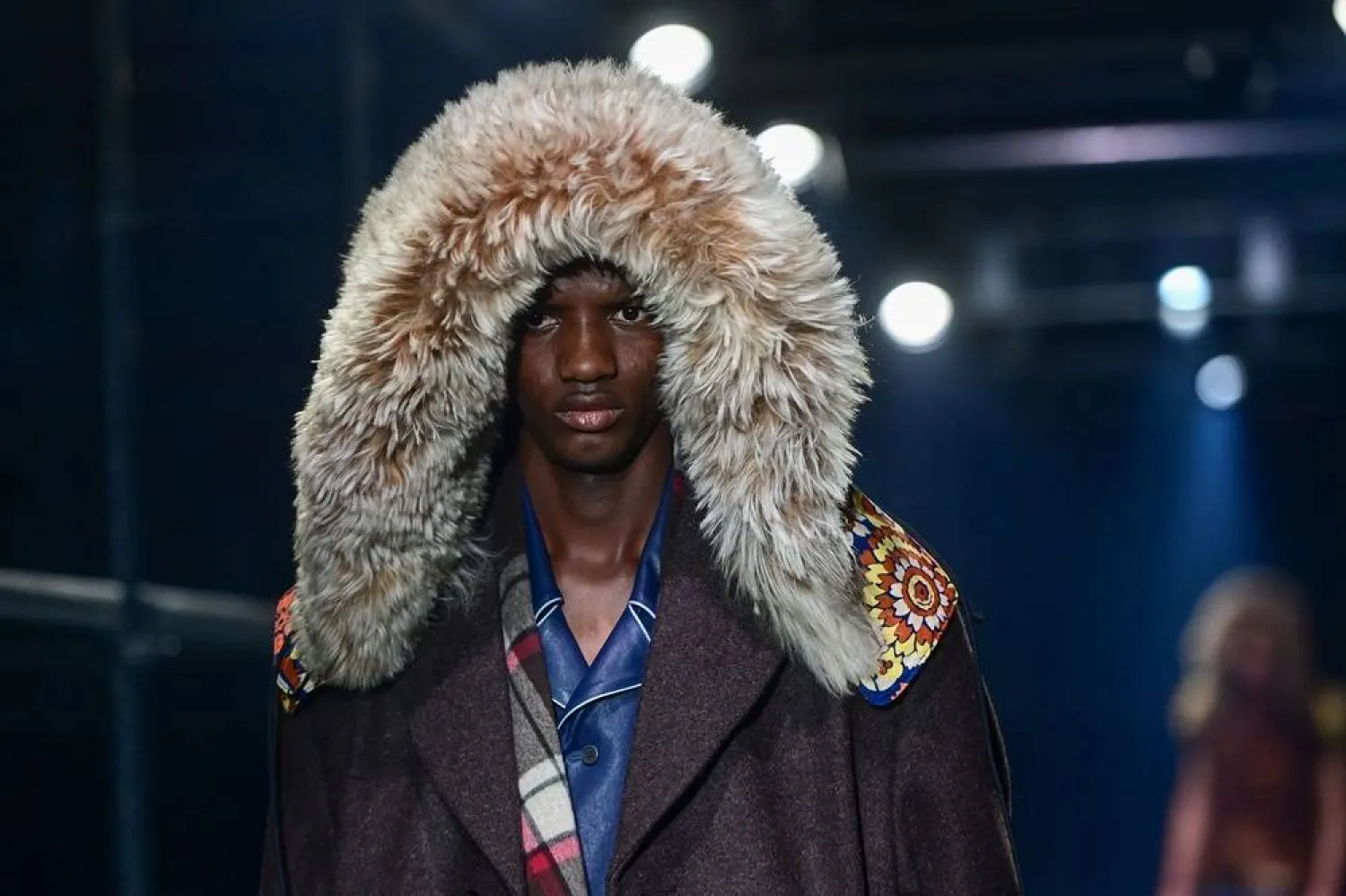  A model walks the runway during the Prada collection show at Milan's Fashion Week Men's Fall / Winter 2025-2026 in Milan, Italy, on January 19, 2025 (AFP)