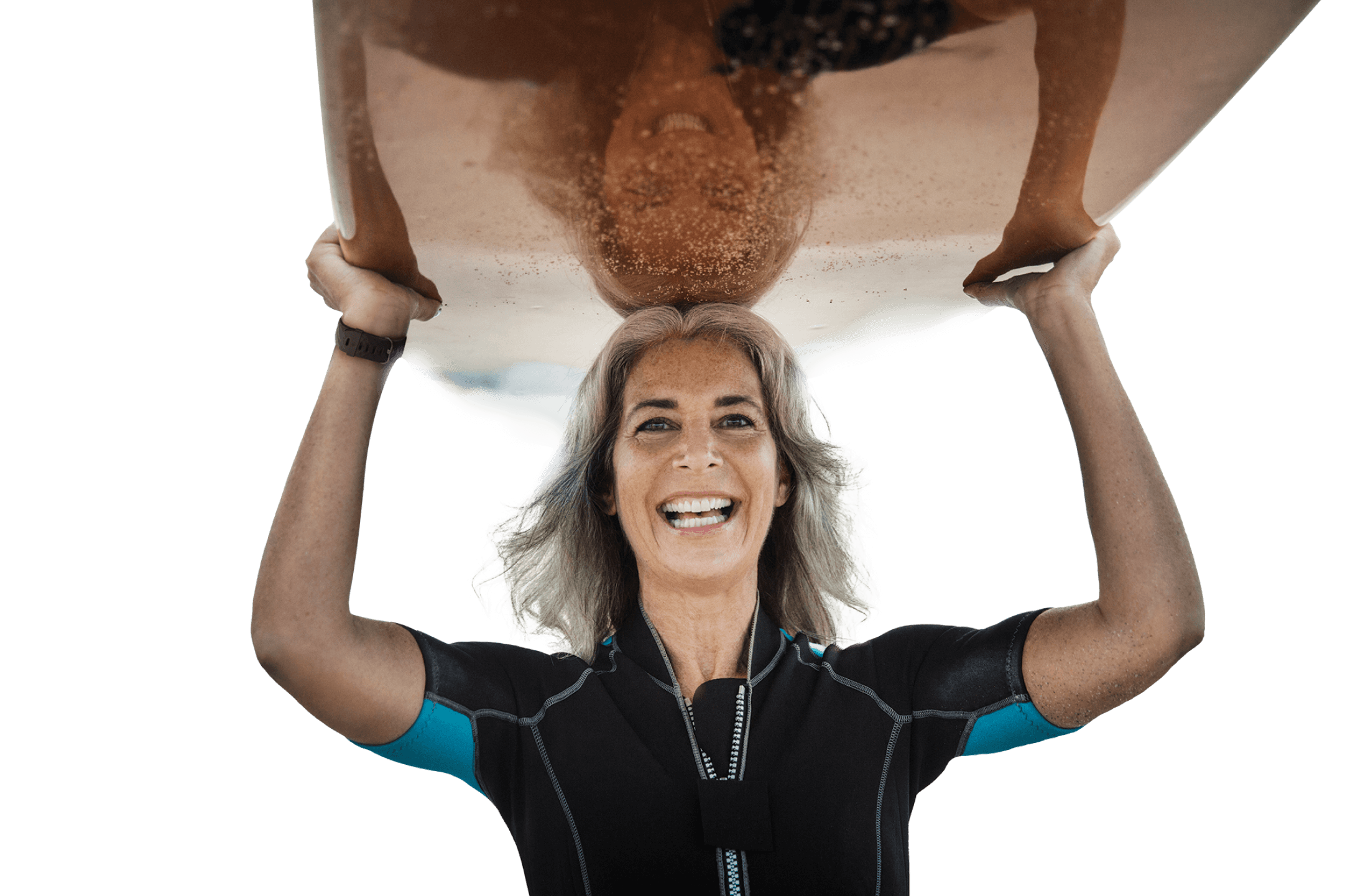 Woman with a surfboard above her head