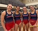 The University of Richmond’s 4x400 relay team — Elke Van der Westhuizen, Nina Lavelle, Molly Flanaga and Morgan Elliot — poses on the track after winning first place at the VMI Invitational.