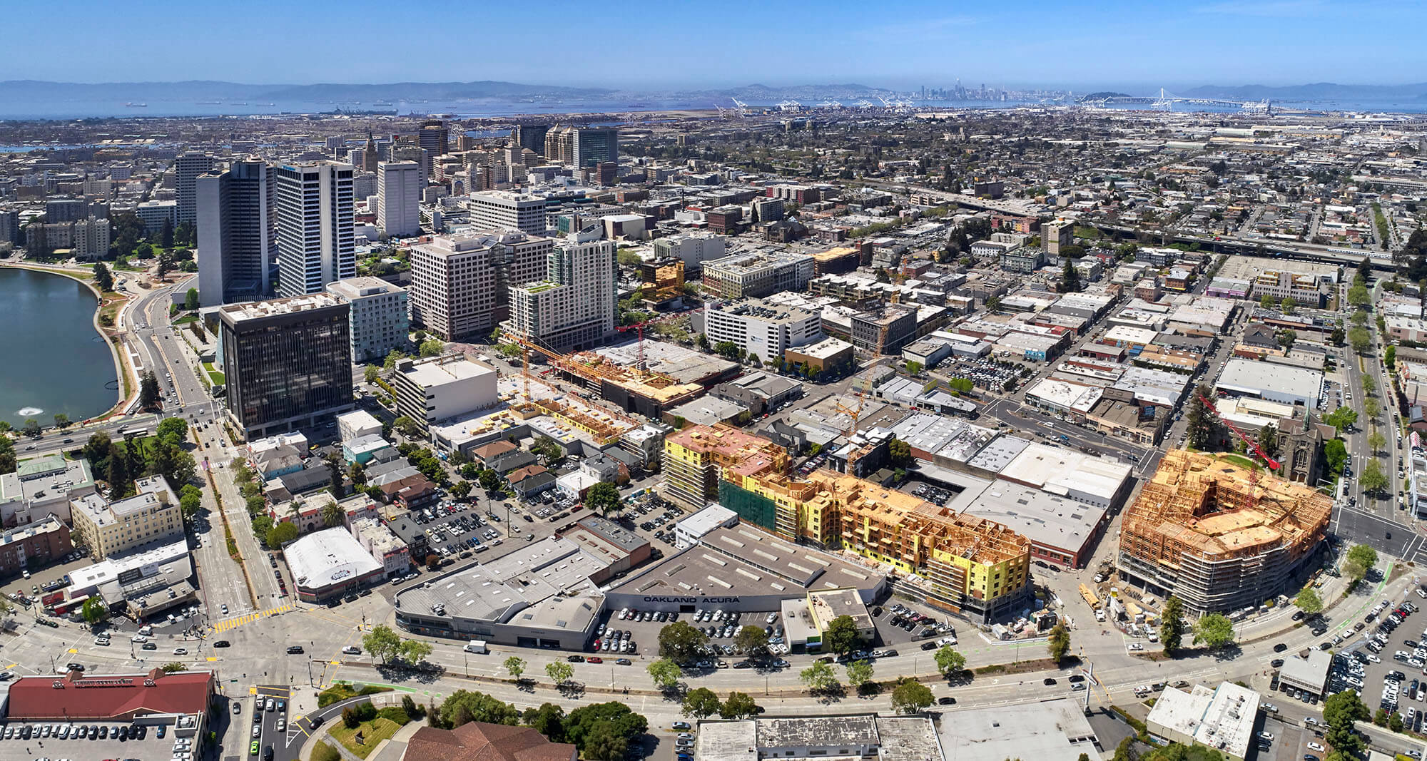 Areal panorama of downtown Oakland with San Francisco in the Background