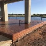 T76 - Merbau Decking with Lake Back Drop