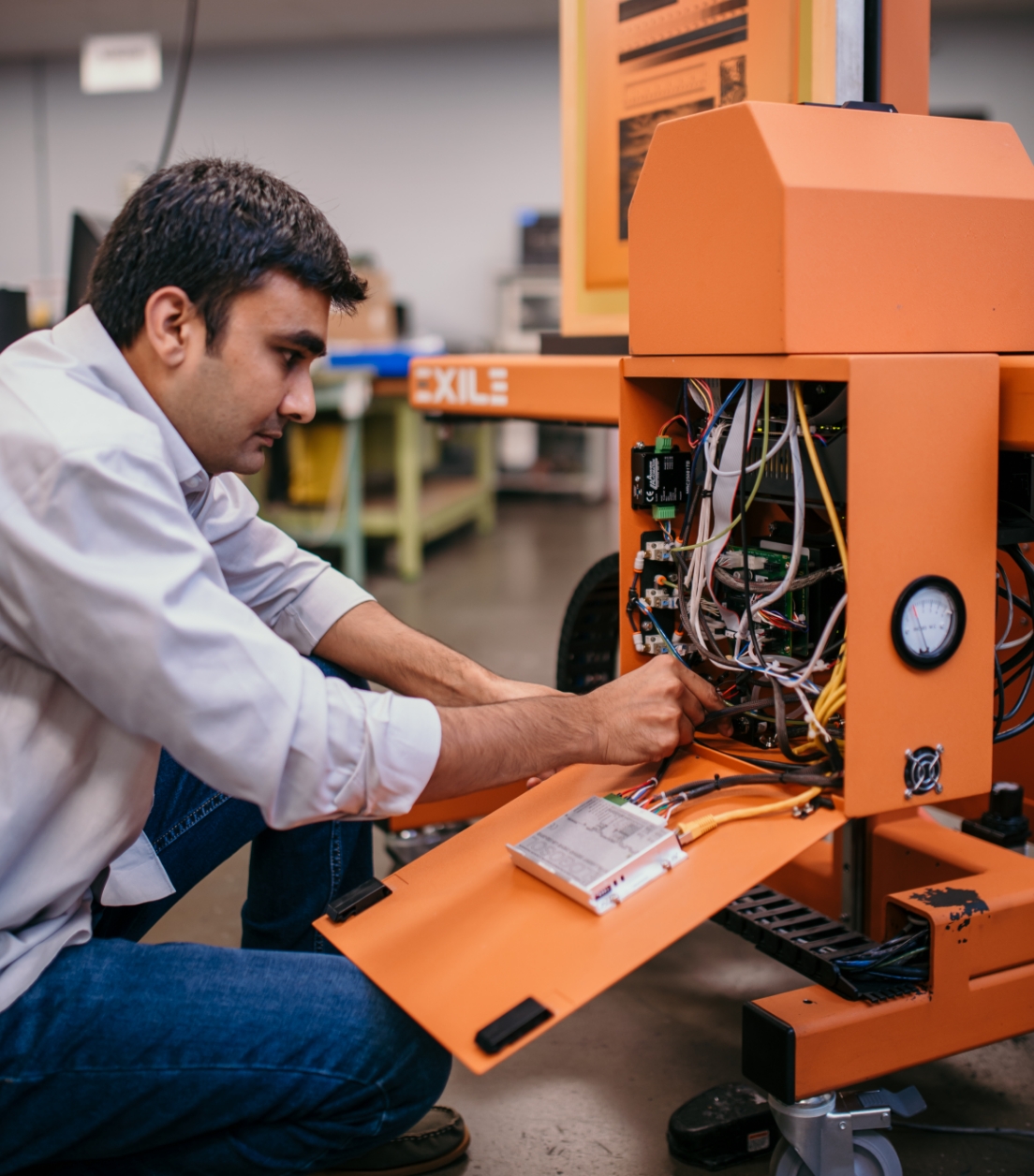 EXILE technician working on a SPYDER system