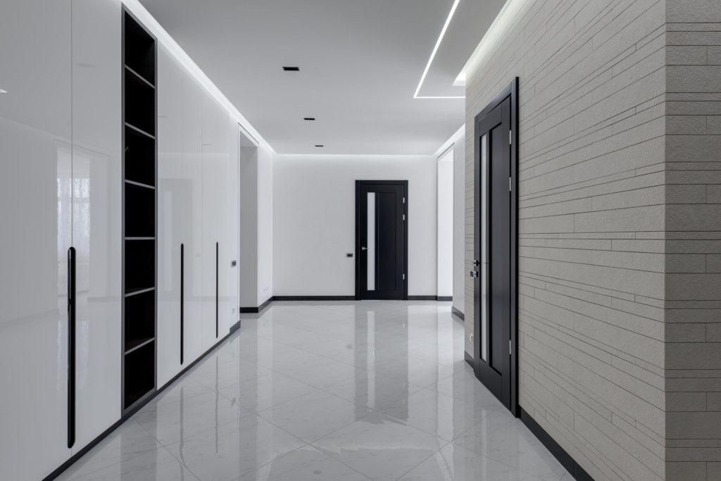 Black interior doors with white walls.