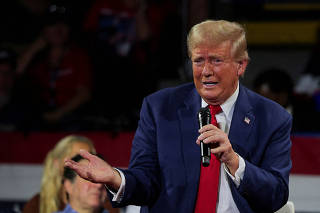 FILE PHOTO: Republican presidential nominee and former U.S. President Trump holds a campaign town hall meeting in Flint