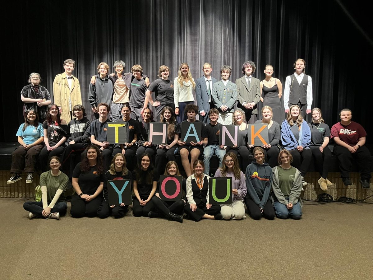 The drama company’s cast and tech crew were thanking the parents for helping set up the play on opening night. Photo Courtesy of Corinne Carlson.