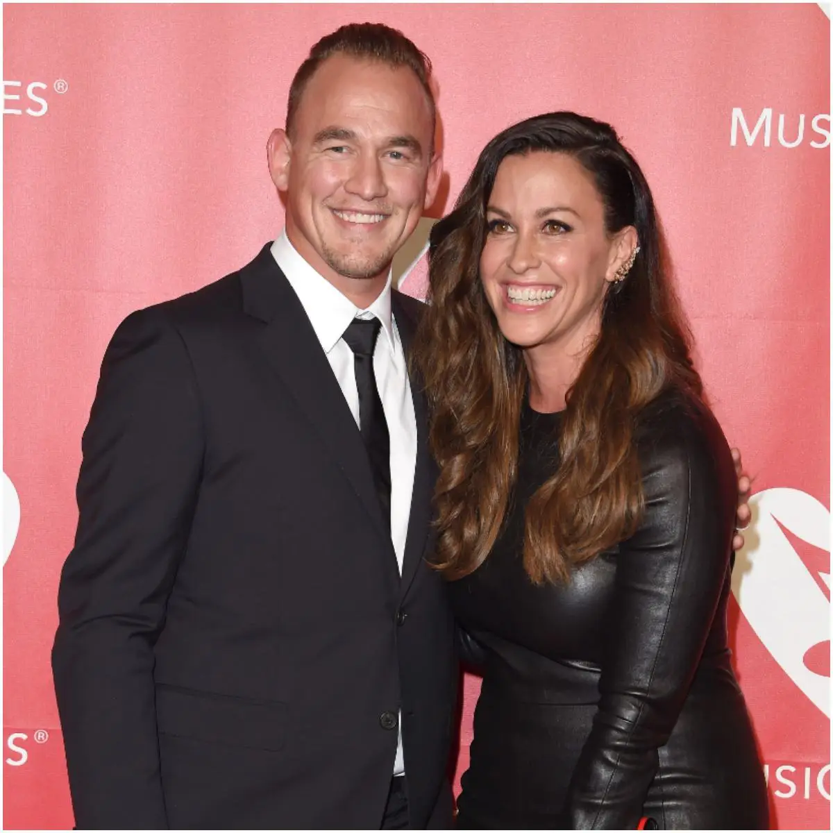 Alanis Morissette wit her husband Souleye