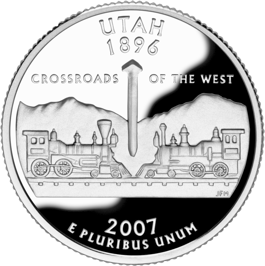 A Silver Coin With A Train On It