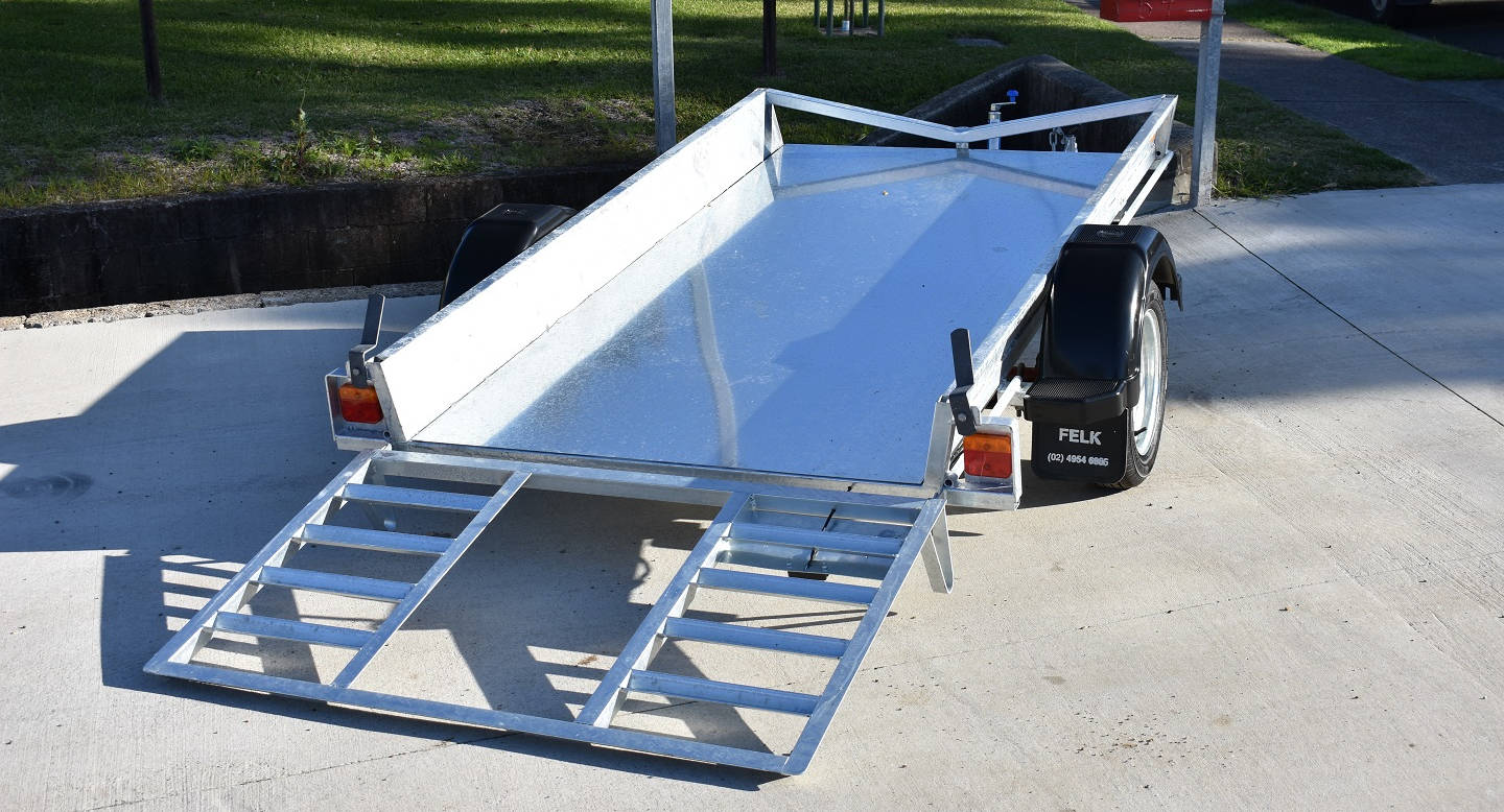 felk engineering golf cart trailer ramps in lowered position