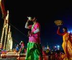 A priest performs 'Ganga Arti' at Sangam