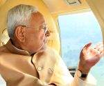 Bihar CM Nitish Kumar conducts an aerial inspection of the damaged embankment at Madhkaul