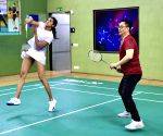 Union Minister Kiren Rijiju plays Badminton along with Badminton player PV Sindhu