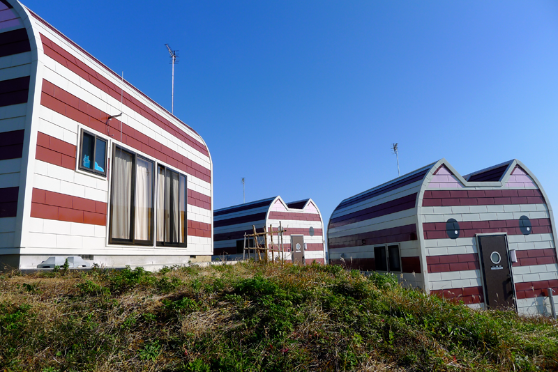 3 buildings shaped like cats