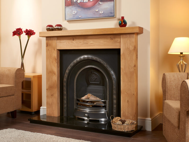 Ashford rustic oak fireplace in light oak complete with a highlighted henley cast iron and a polished granite hearth.