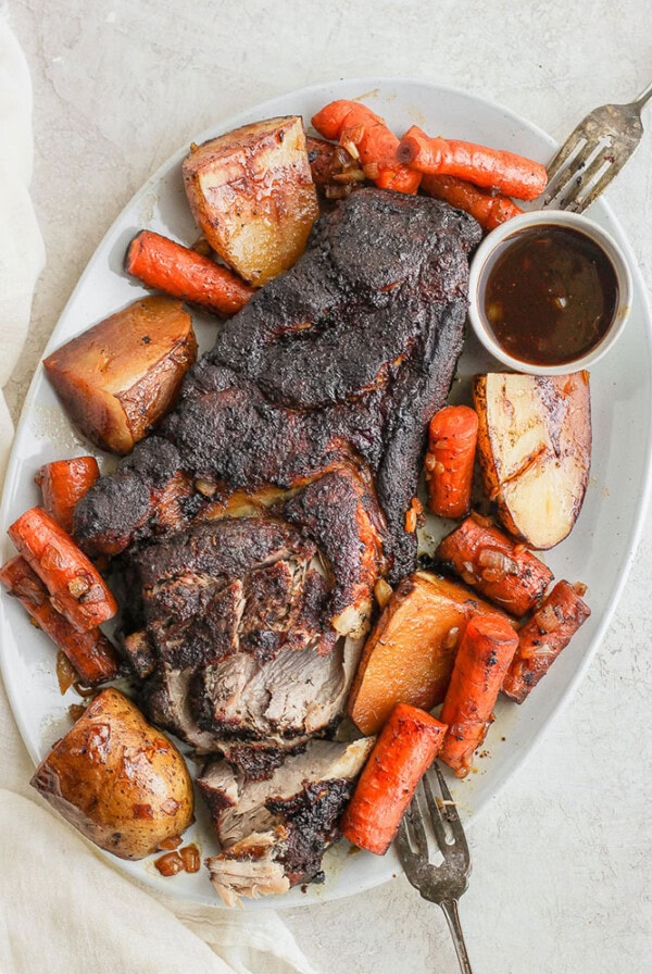 Pork roast on platter.